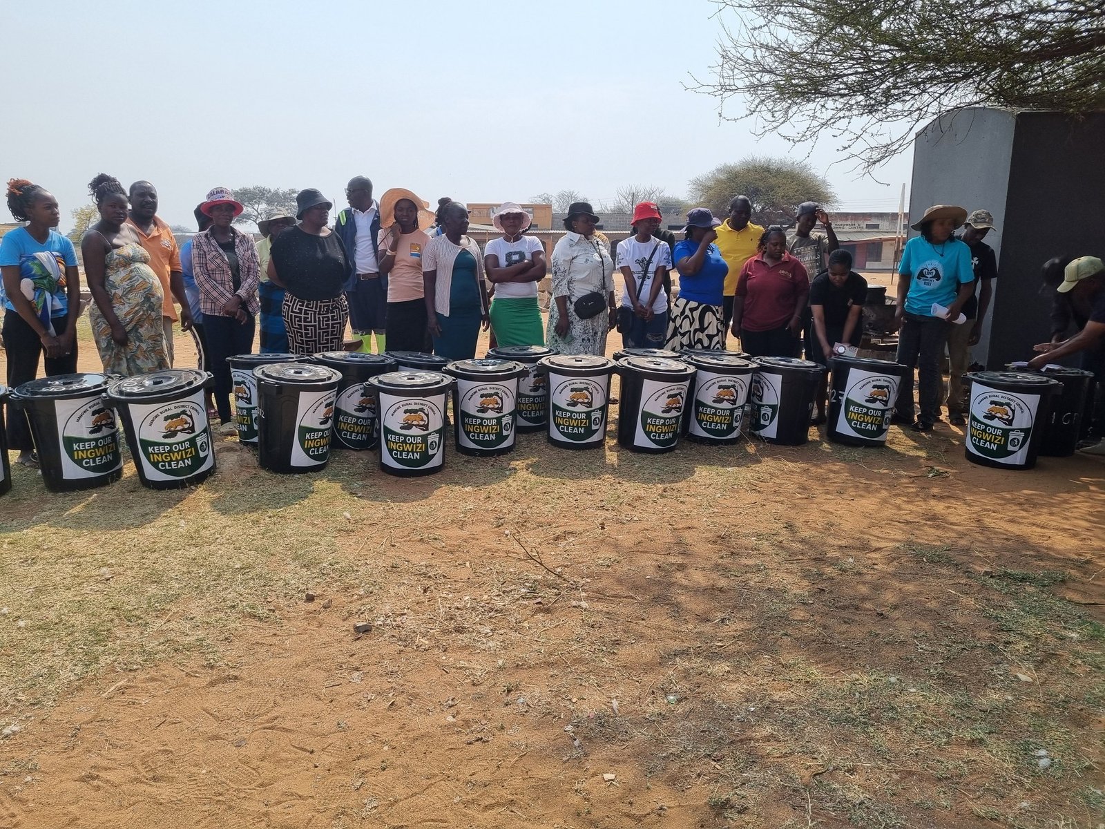 Donation of Bins to business owners in Ingwizi